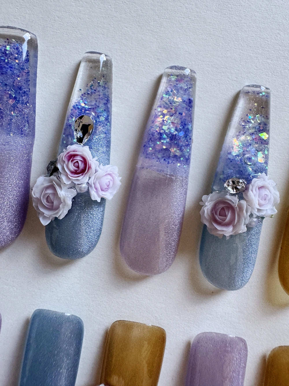 Hand Drawn Elaborate Cool Purple Glittering Cat Eye Flowing Sand Nail Art